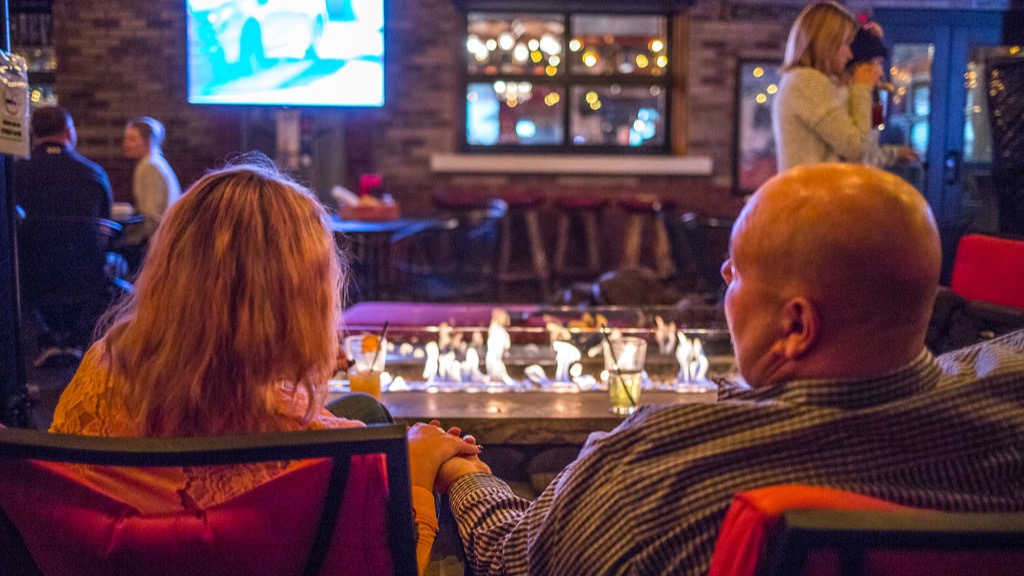 A couple by the fire pit